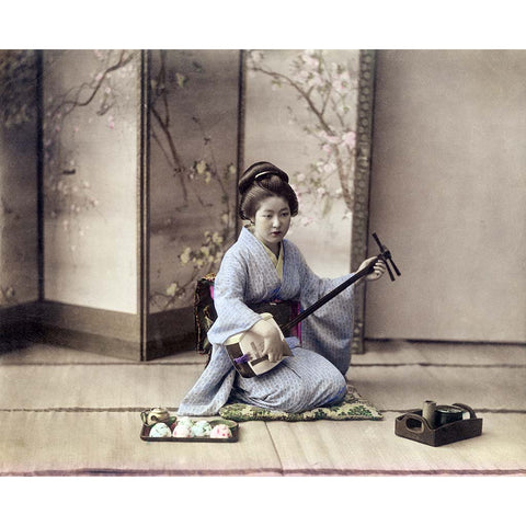 Fine art print of a geisha in kimono playing the shamise, 1890s